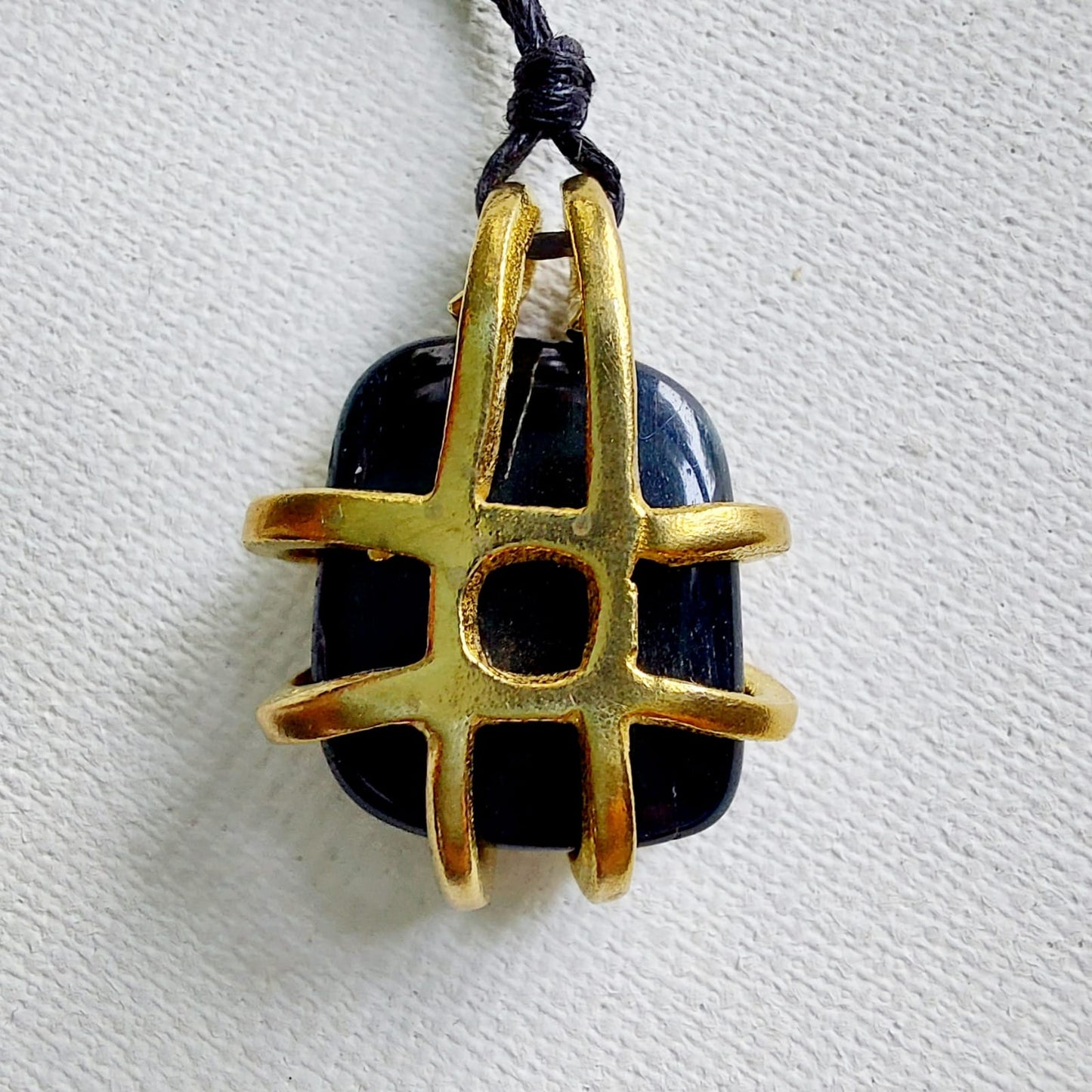 Occhio di Falco Ciondolo Piccolo in Ottone