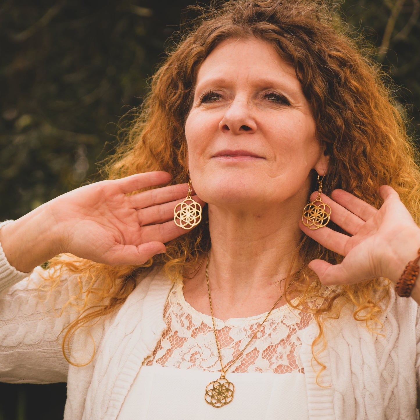 Seme della Vita Maria Orecchini in Ottone con Quarzo Ialino