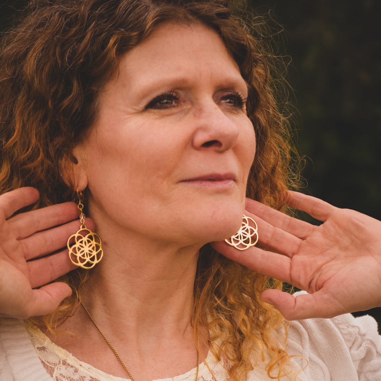 Seme della Vita Maria Orecchini in Ottone con Quarzo Ialino